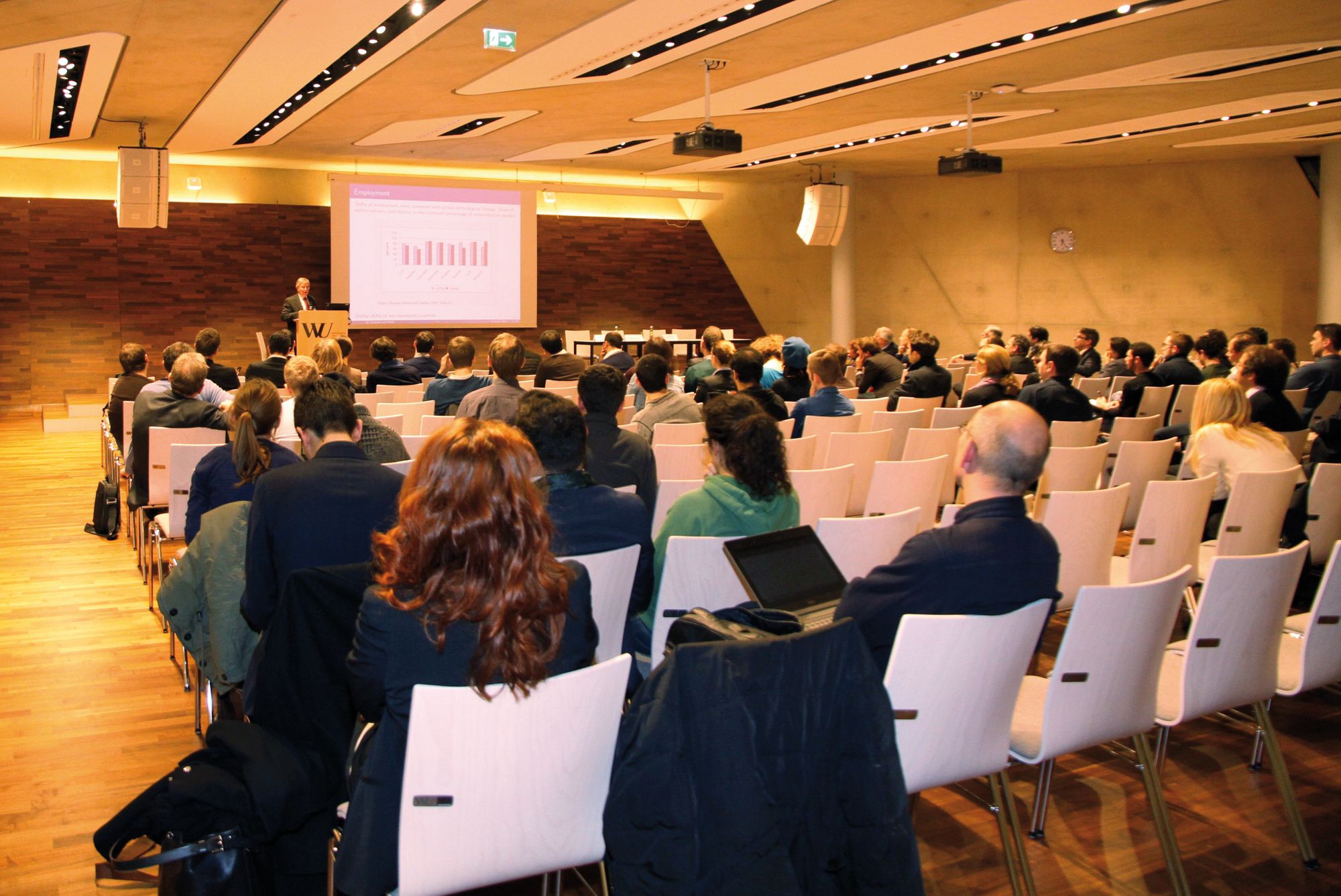 Image from the Keynote Lecture of the 7th FIW Research Conference with audience.